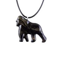 Black with cream streaks reversible wooden gorilla pendant with 18 inches black cord necklace with lobster clasp.