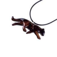 Dark brown wooden panther necklace pendant on a black cord. The panther is carved from wood with dark brown and reddish-brown tones, showing wood grain. The pendant is sleek and modern in style, suitable for men or women.
