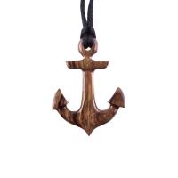 A wooden anchor pendant necklace with black satin cord.