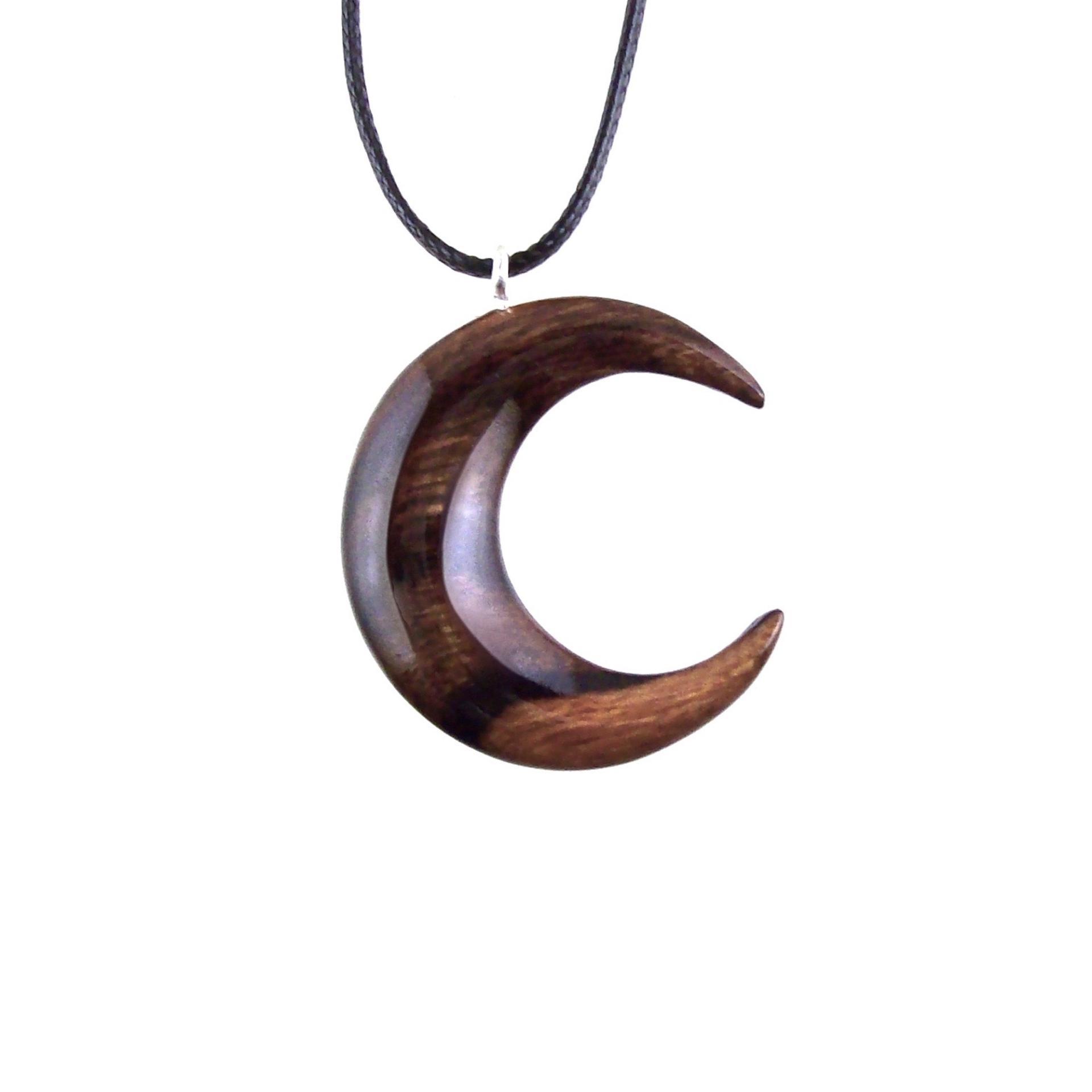 Brown reversible wooden crescent moon pendant with 18 inches black cord necklace with lobster clasp.