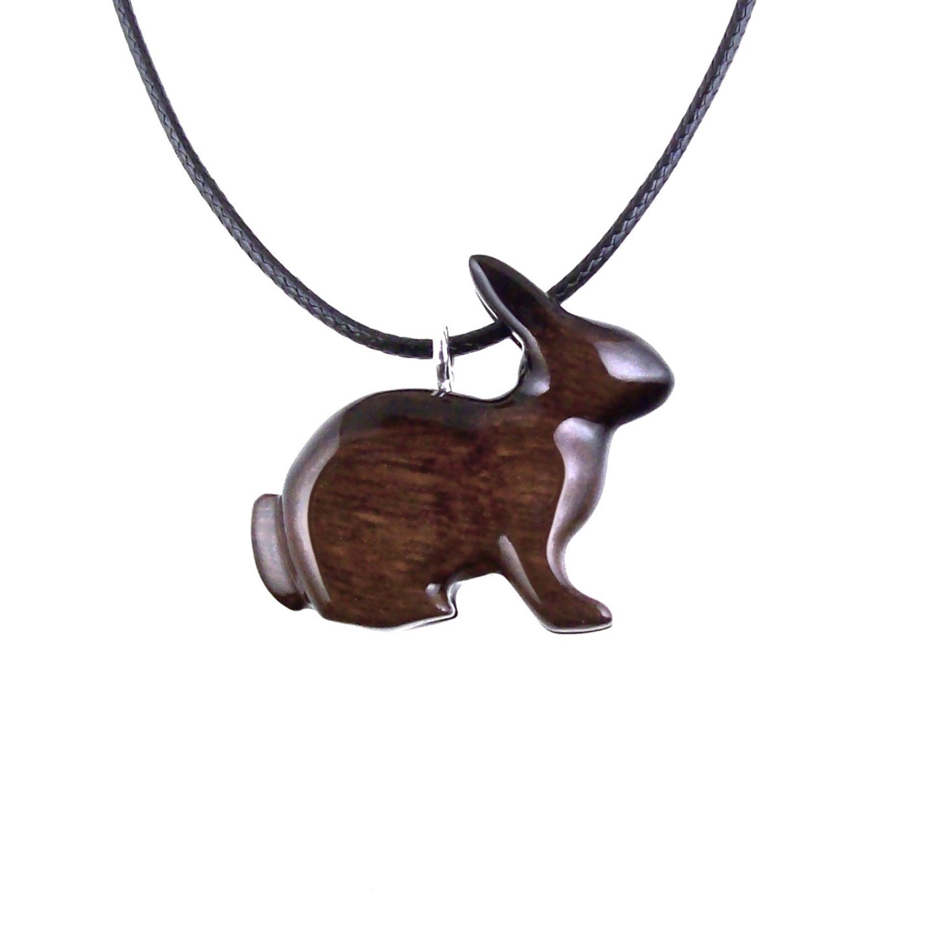 Brown reversible wooden sitting rabbit pendant with 18 inches black cord necklace with lobster clasp.