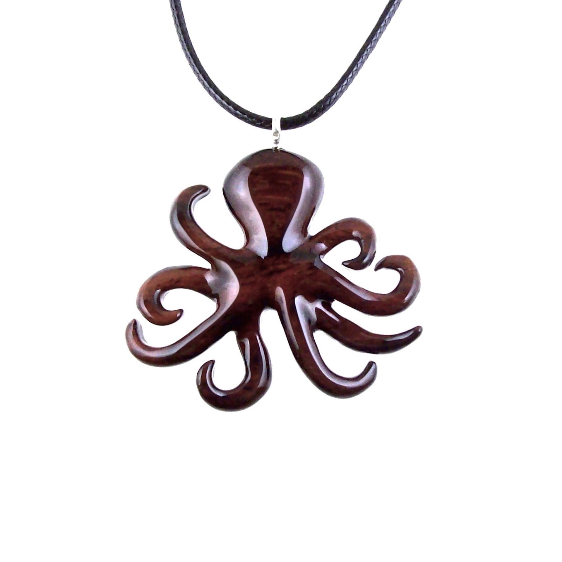 Reddish-brown reversible wooden octopus pendant with 18 inches black cord necklace with lobster clasp.