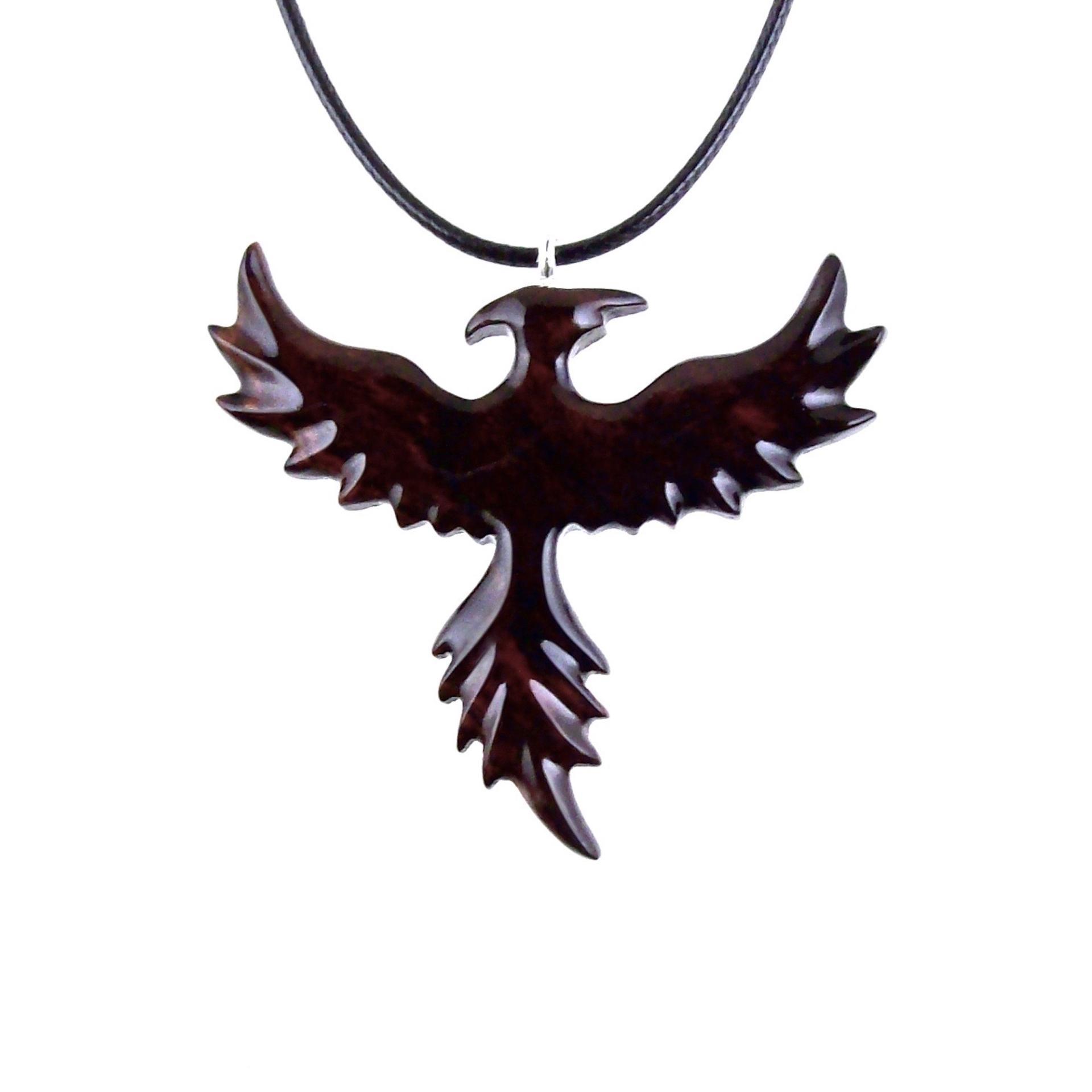 Reddish-brown reversible wooden flying phoenix bird pendant with 18 inches black cord necklace with lobster clasp.