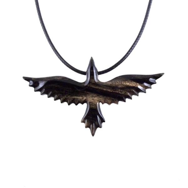 black and cream reversible wooden flying raven pendant with 18 inches black cord necklace with lobster clasp