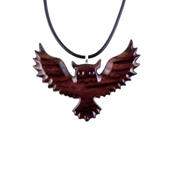 Reddish-brown reversible wooden flying owl pendant with 18 inches black cord necklace with lobster clasp.