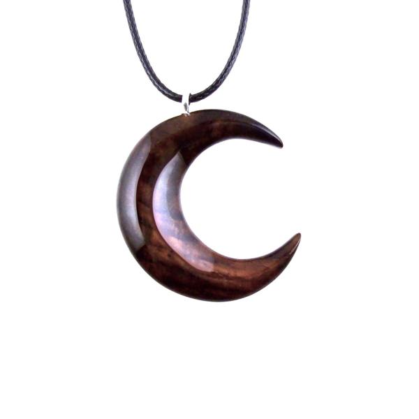 Reddish-brown reversible wooden crescent moon pendant with 18 inches black cord necklace with lobster clasp.