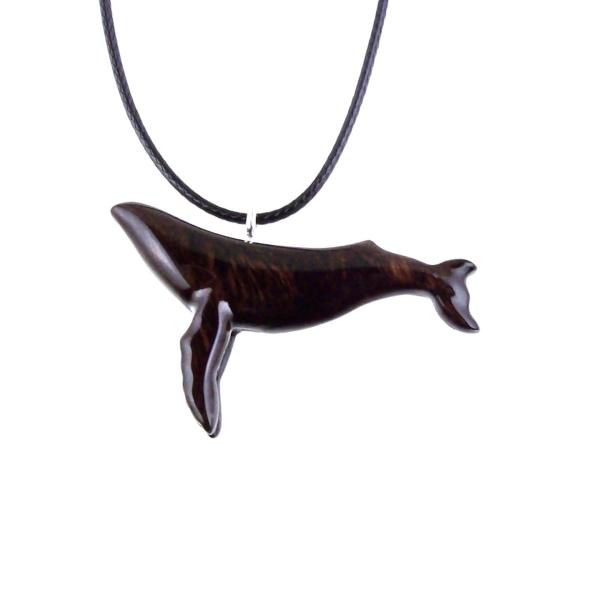 Brown reversible wooden humpback whale pendant with 18 inches black cord necklace with lobster clasp.