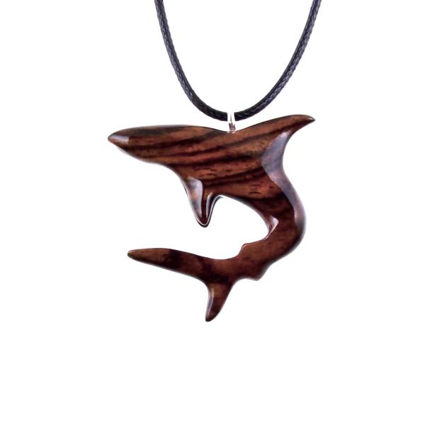 Reddish-brown reversible wooden shark pendant with 18 inches black cord necklace with lobster clasp.